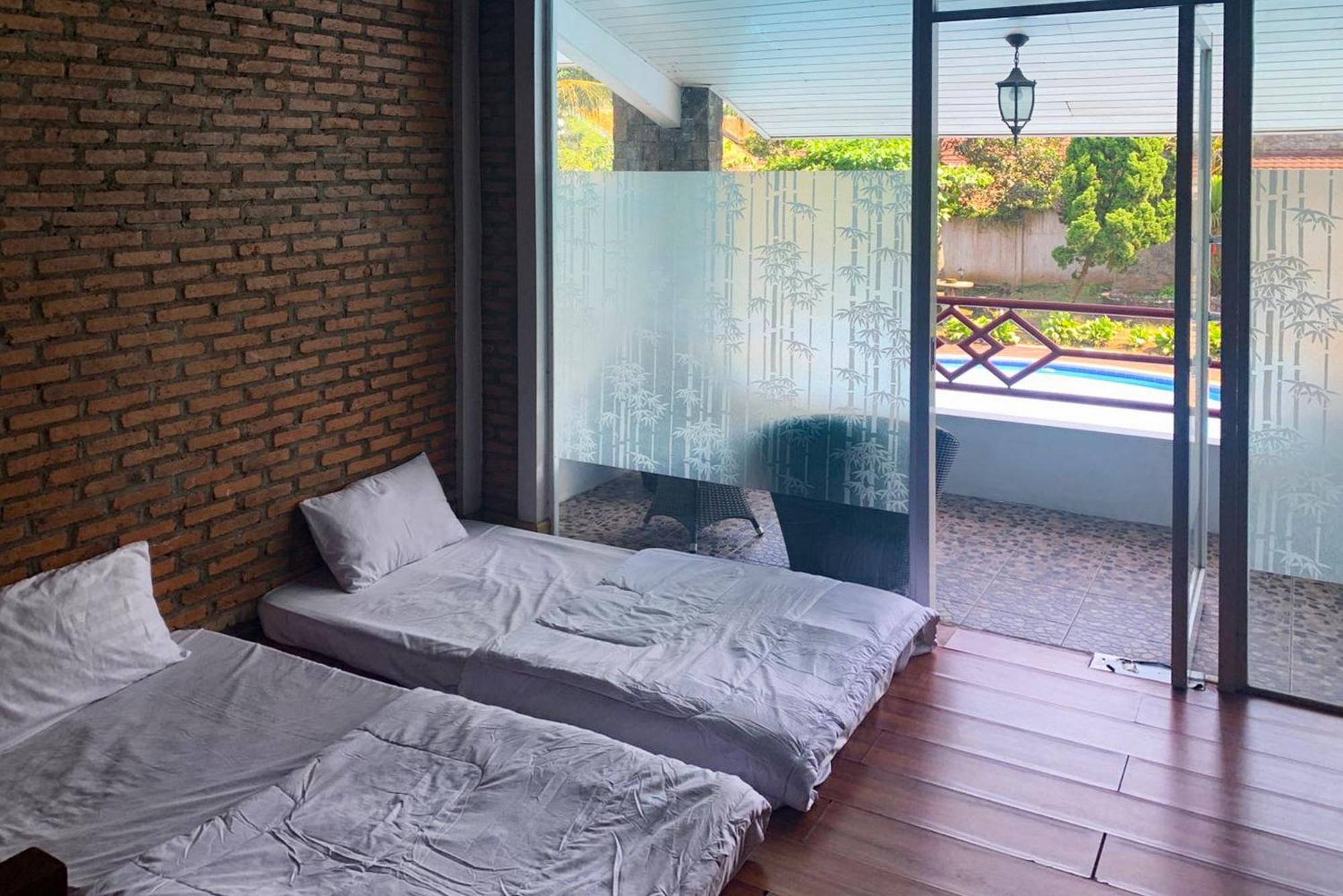 Urbanview Hotel Villa Q Gisting Bandjarnegeri Exterior photo
